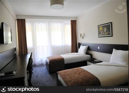 bright and clean hotel room interior with modern furniture