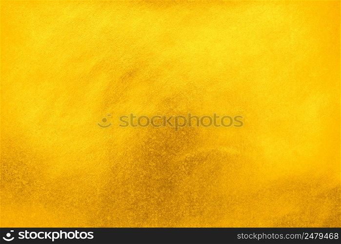 Bright and shiny gold foil paper texture