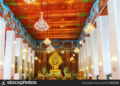 bright beautiful interior of a Buddhist temple in Bangkok, Thailand