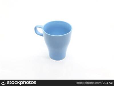 Bright blue ceramic cup with handle isolated on white background