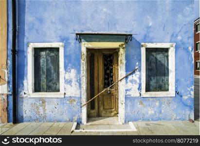 Bright blue color house in Burano, Venice