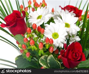 Bright bouquet with chamomiles and roses