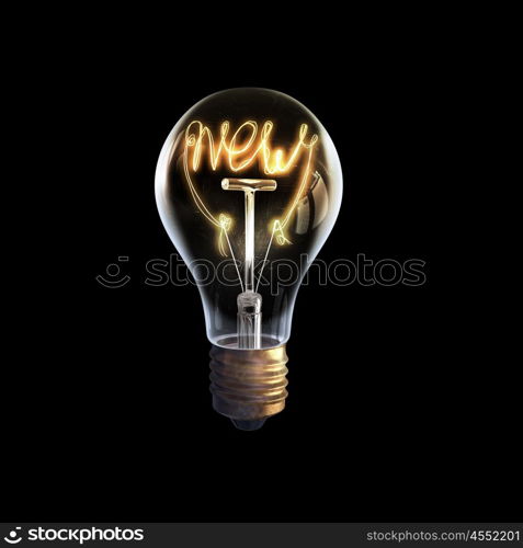 Bright business idea. Glowing glass light bulb with concept inside on dark background