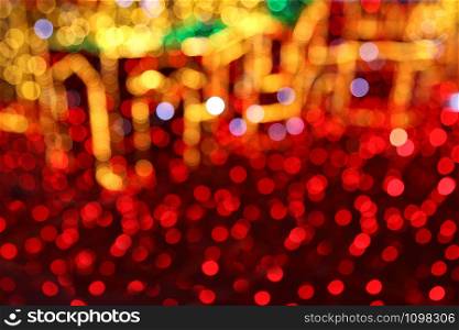 Bright Christmas decoration, colorful lights of bulbs, abstract background out of focus