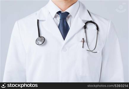 bright close up of male doctor with stethoscope