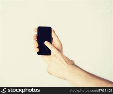 bright close up of man showing smartphone