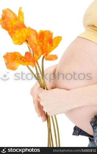 bright closeup picture of beautiful pregnant woman belly