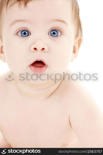 bright closeup picture of blue-eyed baby boy