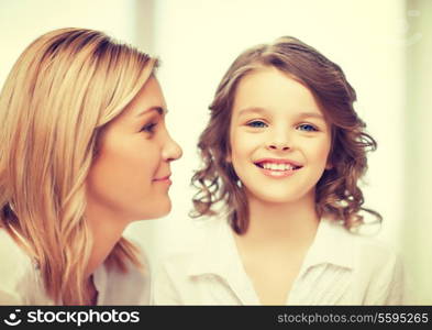 bright closeup picture of mother and daughter