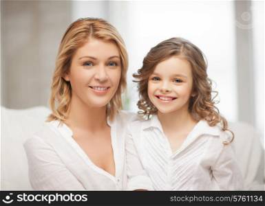 bright closeup picture of mother and daughter