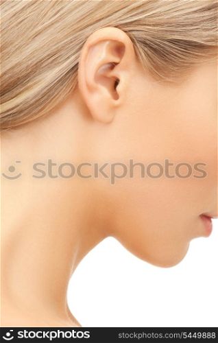 bright closeup picture of woman&#39;s ear