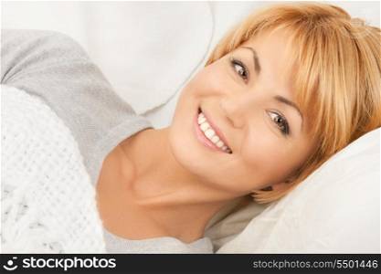bright closeup picture of woman in bed&#xA;
