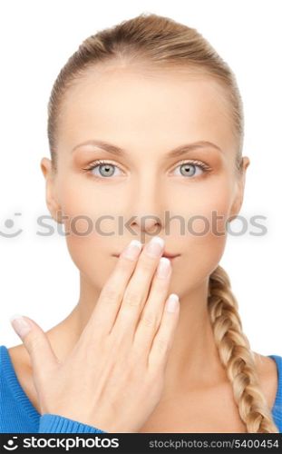 bright closeup picture of woman with hand over mouth.