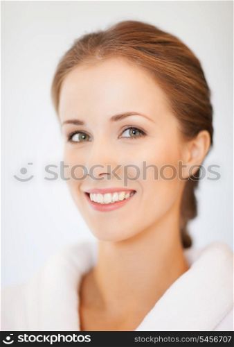 bright closeup portrait picture of beautiful woman in bathrobe