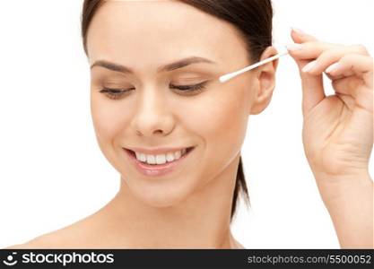 bright closeup portrait picture of beautiful woman with cotton bud