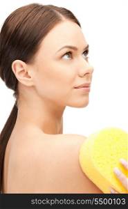 bright closeup portrait picture of beautiful woman with sponge