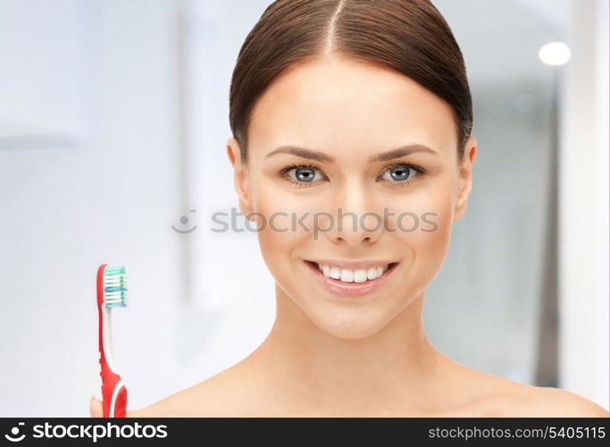 bright closeup portrait picture of beautiful woman with toothbrush