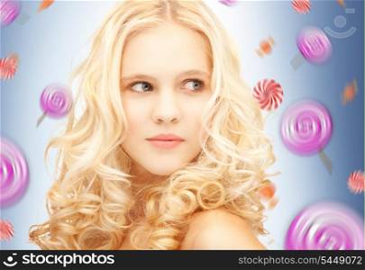 bright closeup portrait picture of happy teenage girl with lollipops