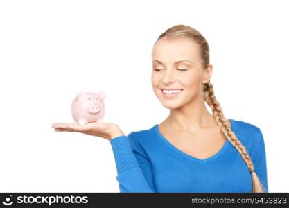 bright closeup portrait picture of lovely woman with piggy bank