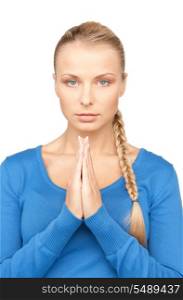 bright closeup portrait picture of praying businesswoman