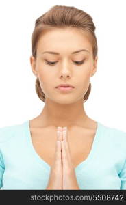 bright closeup portrait picture of praying businesswoman