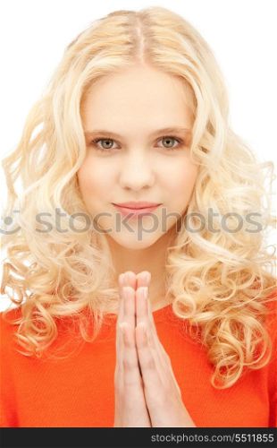 bright closeup portrait picture of praying businesswoman
