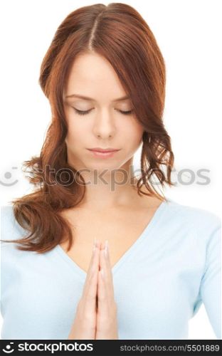 bright closeup portrait picture of praying businesswoman&#xA;