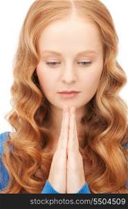 bright closeup portrait picture of praying businesswoman&#xA;