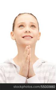 bright closeup portrait picture of praying teenage girl