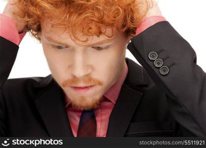 bright closeup portrait picture of unhappy man