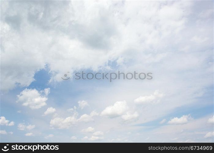 bright clouds on blue sky