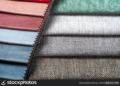 Bright collection of colorful textile s&les. Fabric swatches, set in different colors for selection. Variety colors of upholstery material for furniture and interior. Fabric texture background