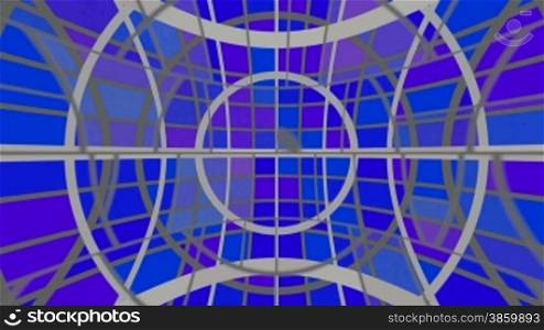 Bright color rings move on a changing background consisting of different geometrical figures. Colors and forms change.