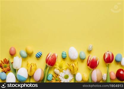 bright colored eggs with flowers yellow. Beautiful photo. bright colored eggs with flowers yellow