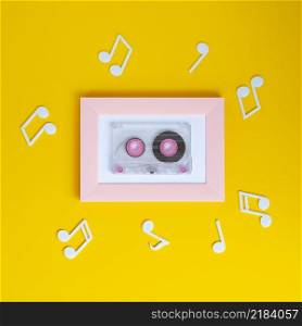 bright colorful cassette tape with musical notes around it