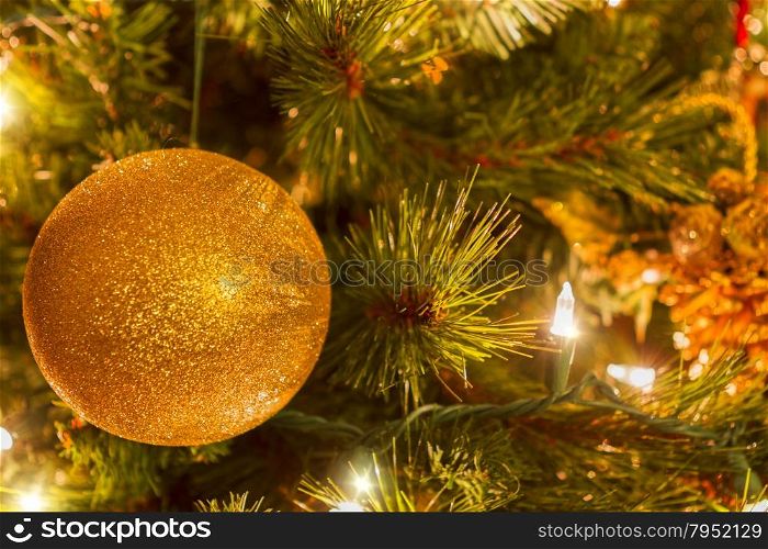 Bright colorful decorations on a Christmas Tree.