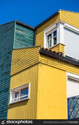 Bright colorful houses on the seaside street in the port of La Rochelle, France