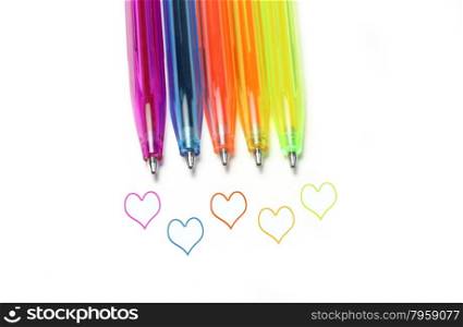 Bright colorful pens and abstract hearts on white background