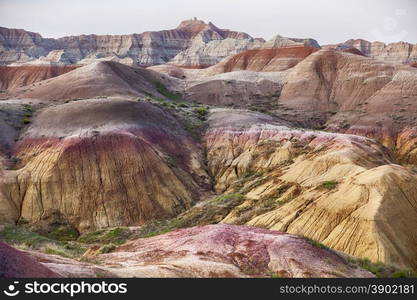 Bright colors exist in the Yellow Mounds area of the Badlands National Park. The hills here are characterized by the yellow and red colors of the weathered and eroded sediments of the ancient sea floor.&#xA;