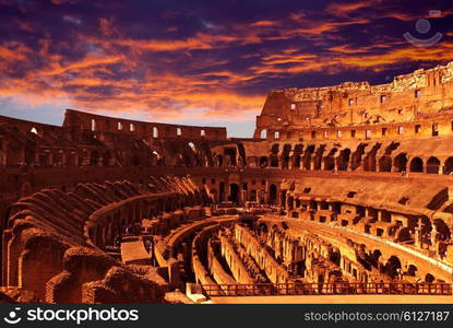 Bright crimson sunset over the ancient Colosseum. Rome. Italy