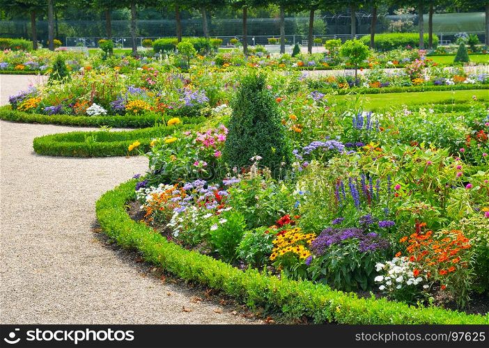 Bright flower bed in a summer park.