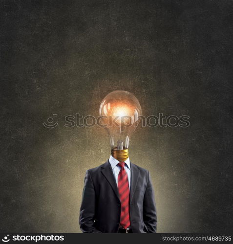 Bright head. Businessman in suit with light bulb instead of head