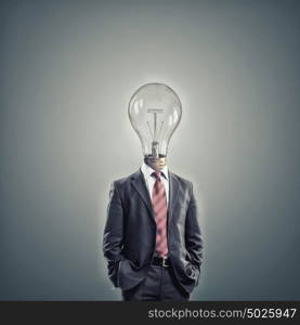 Bright head. Businessman in suit with light bulb instead of head