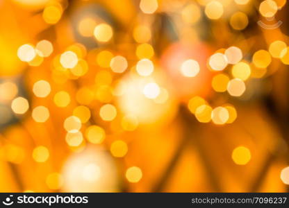 Bright hexagonal light bokeh on vivid orange color background. Bright hexagonal bokeh on vivid orange color background