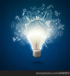 Bright idea. Conceptual image of electric bulb with business sketches