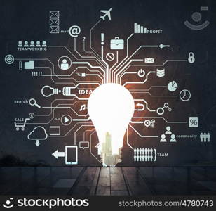 Bright idea for success. Glowing light bulb on computing concept background