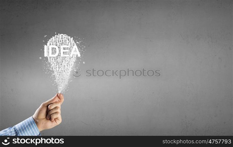 Bright idea in hand. Businessman hand holding idea light bulb concept