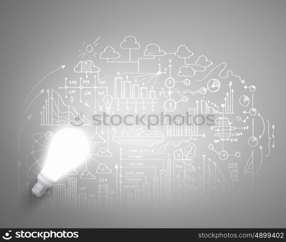 Bright ideas. Conceptual image of light bulb and business sketches