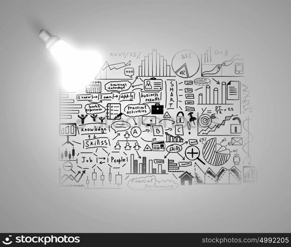 Bright ideas for business. Glowing light bulb on wall with sketches strategy plan