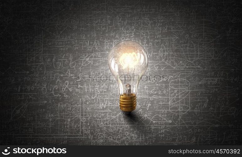 Bright ideas on wall. Glowing glass light bulb and business sketches at concrete background